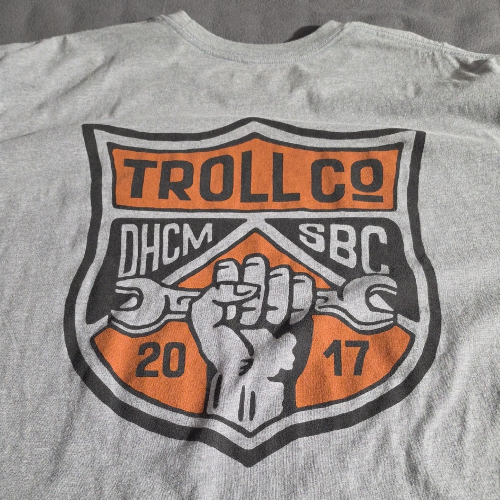 Trolls Gray Short Sleeve Tee with Orange and Black Shield Graphic